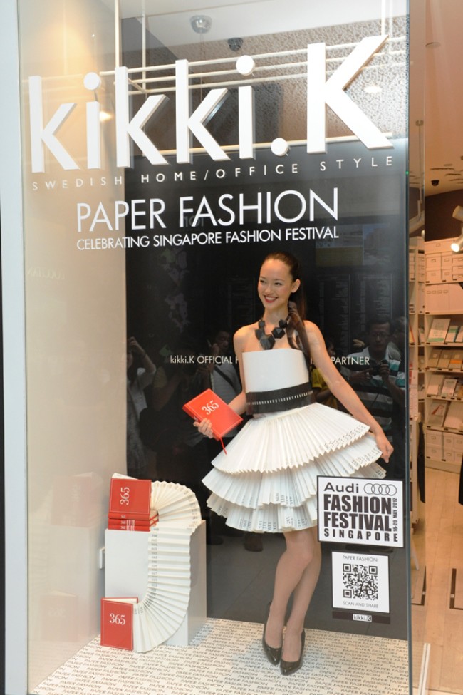 WTFSG-kikki-k-10-year-anniversary-paper-dress-fiona-fussi-behind-glass