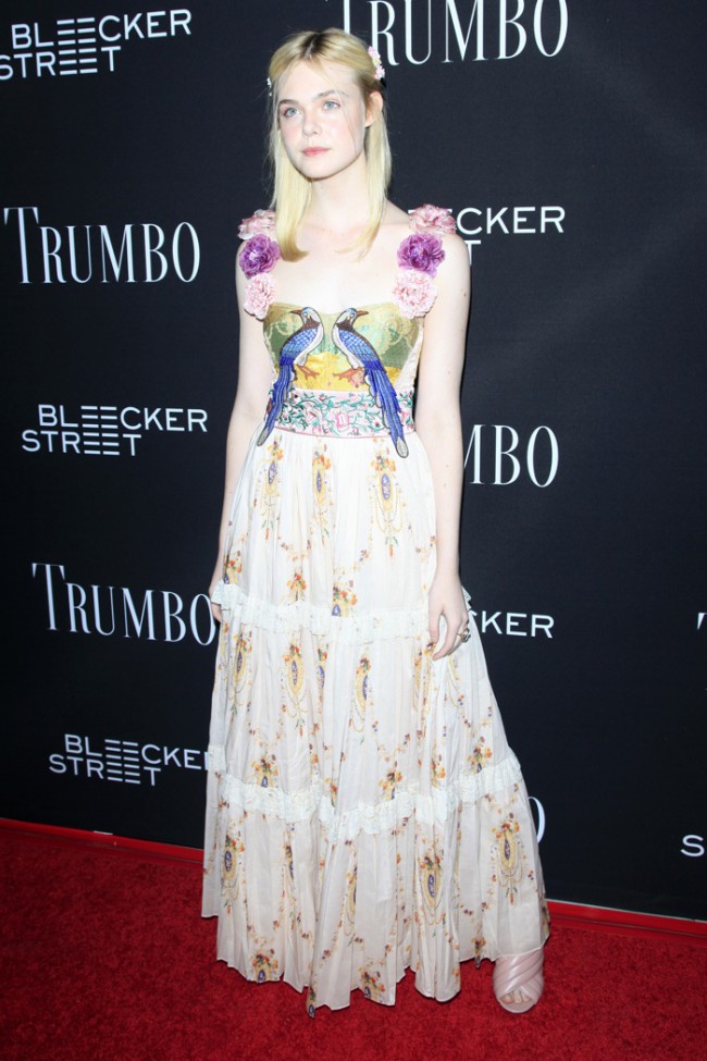 Spotted in LA, actress Elle Fanning with a Gucci Blooms printed Dionysus  bag and wearing a pair…