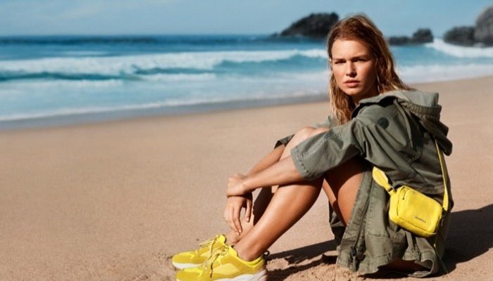 Gisele Bündchen brings luggage to the beach in Louis Vuitton ad